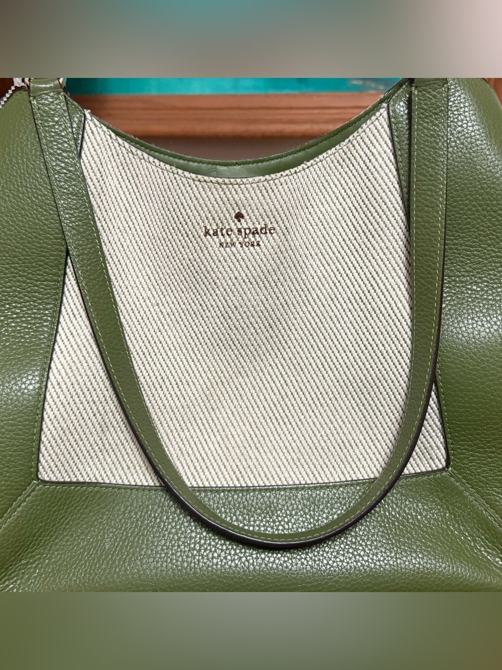 Kate Spade Lena canvas shoulder bag in green and cream.
